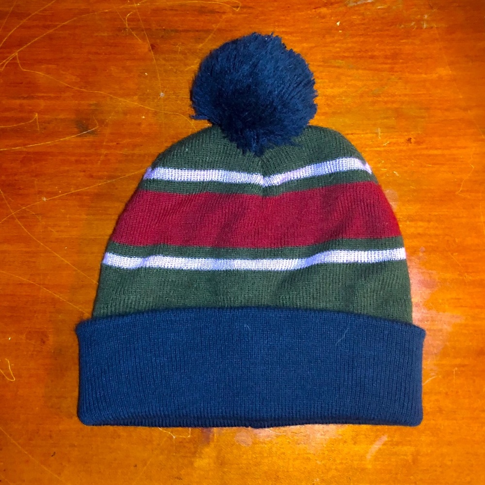 navy blue and green striped winter puffbal…